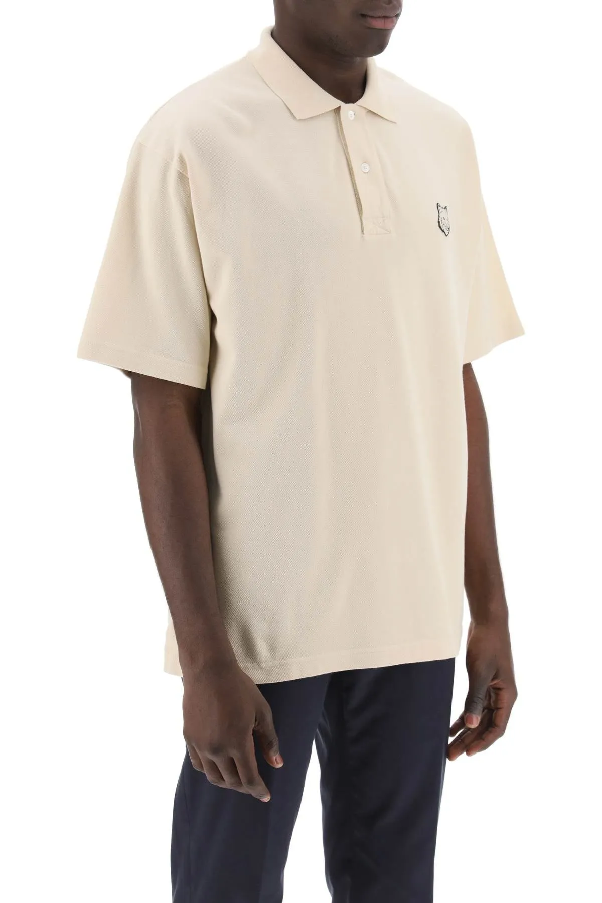 "oversized polo shirt with bold fox
